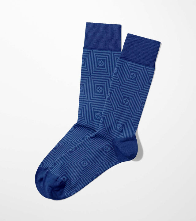 A digital mockup of blue squares socks, on a light grey background.